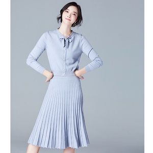Pale blue woolen knitwear pleated skirt suit